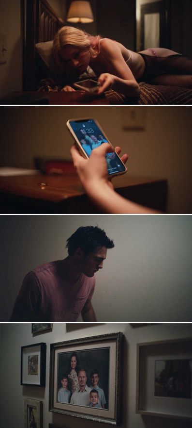 Jules looking a picture of Cal&#x27;s family on his phone and Nate passing the same picture on a wall in his house