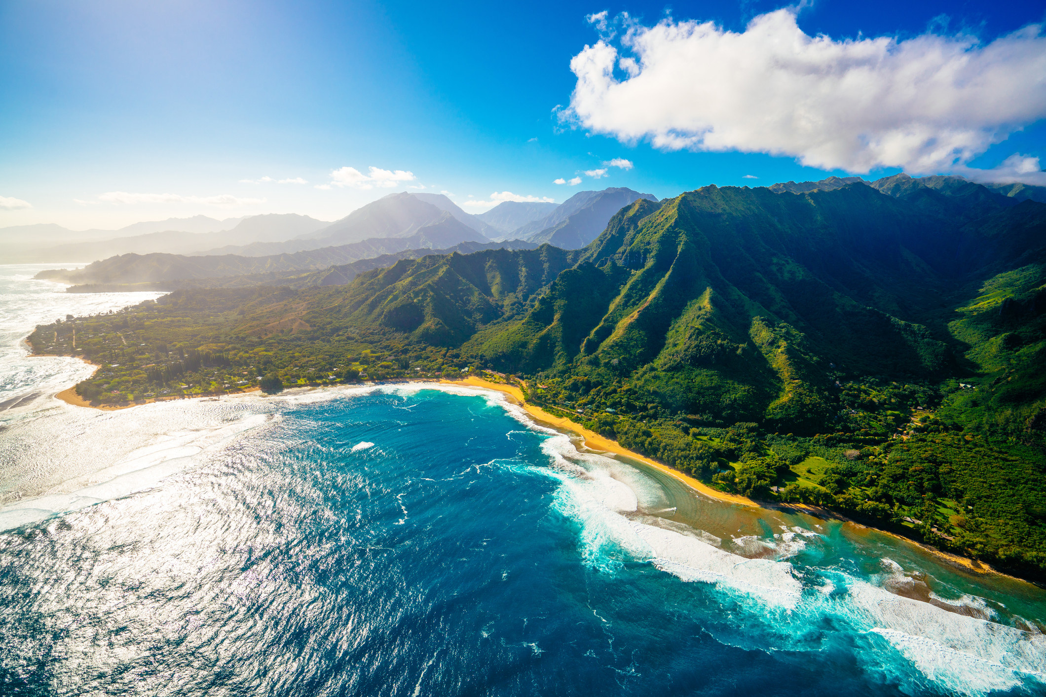 Aerial view of mountains and sea in Kauai.