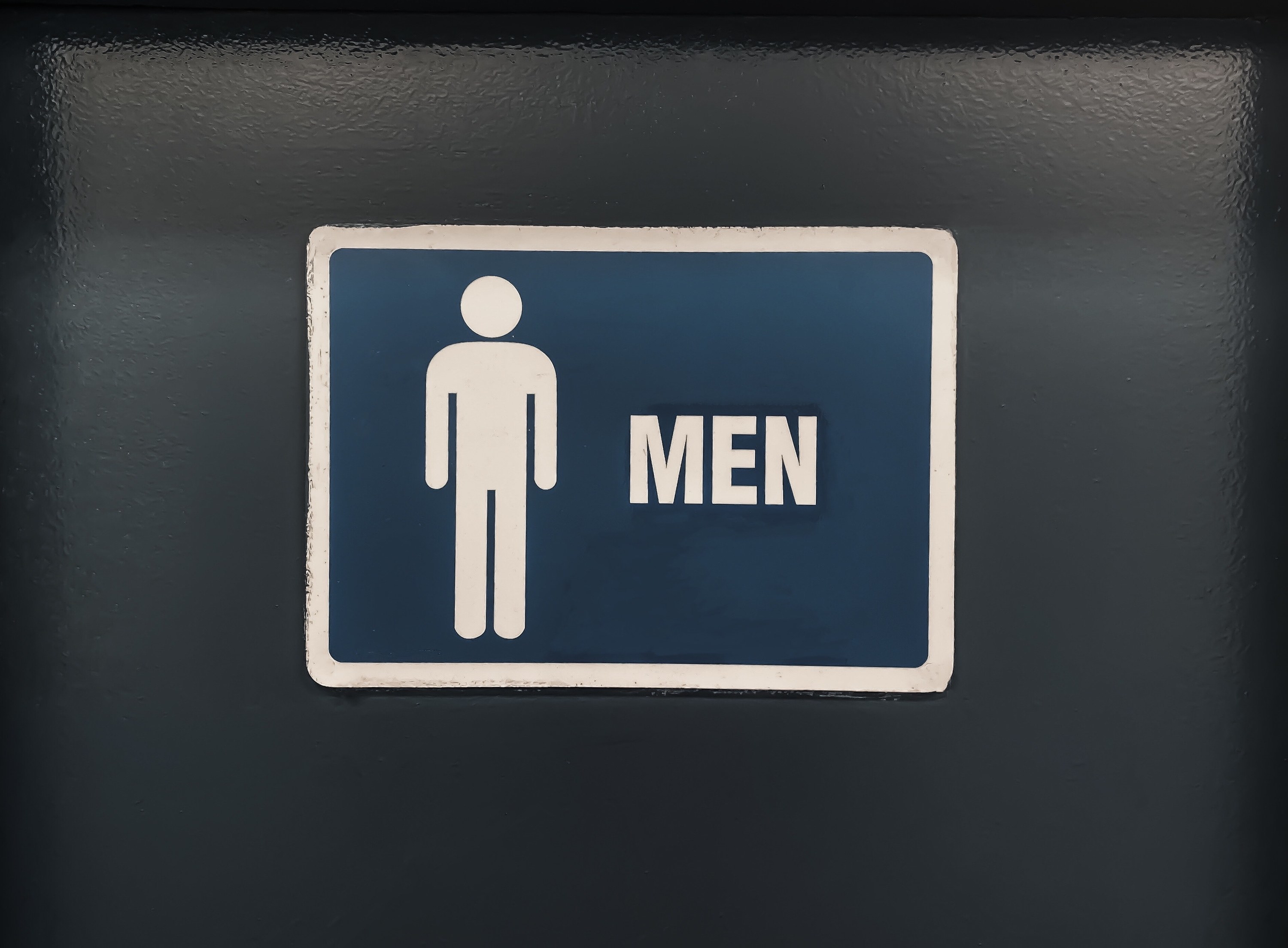 a mens bathroom sign