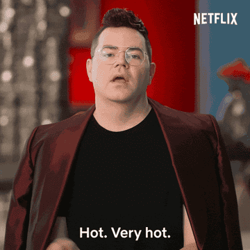 Gif of someone fanning their face saying, &quot;hot. very hot&quot;