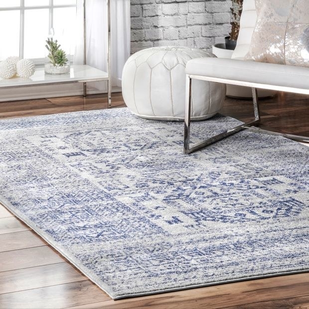 Light blue and white geometric rug