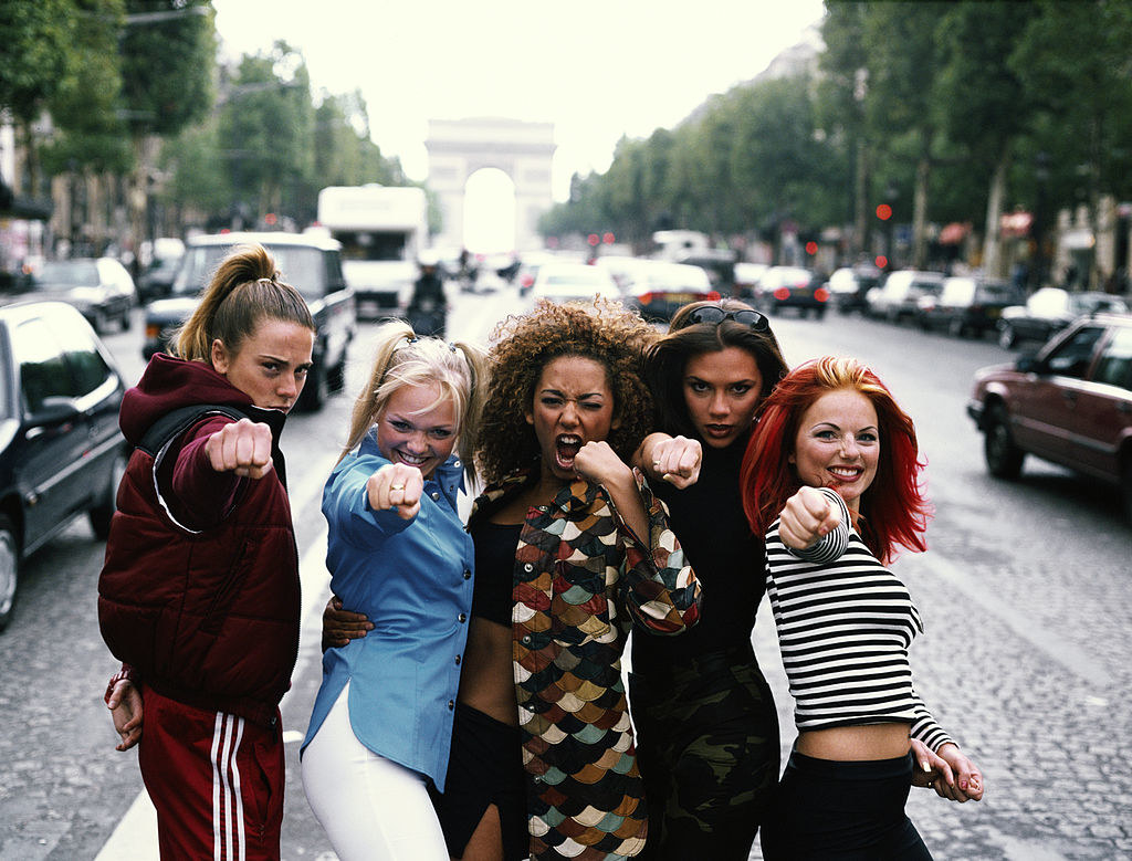 the girls doing a girl power punch in paris