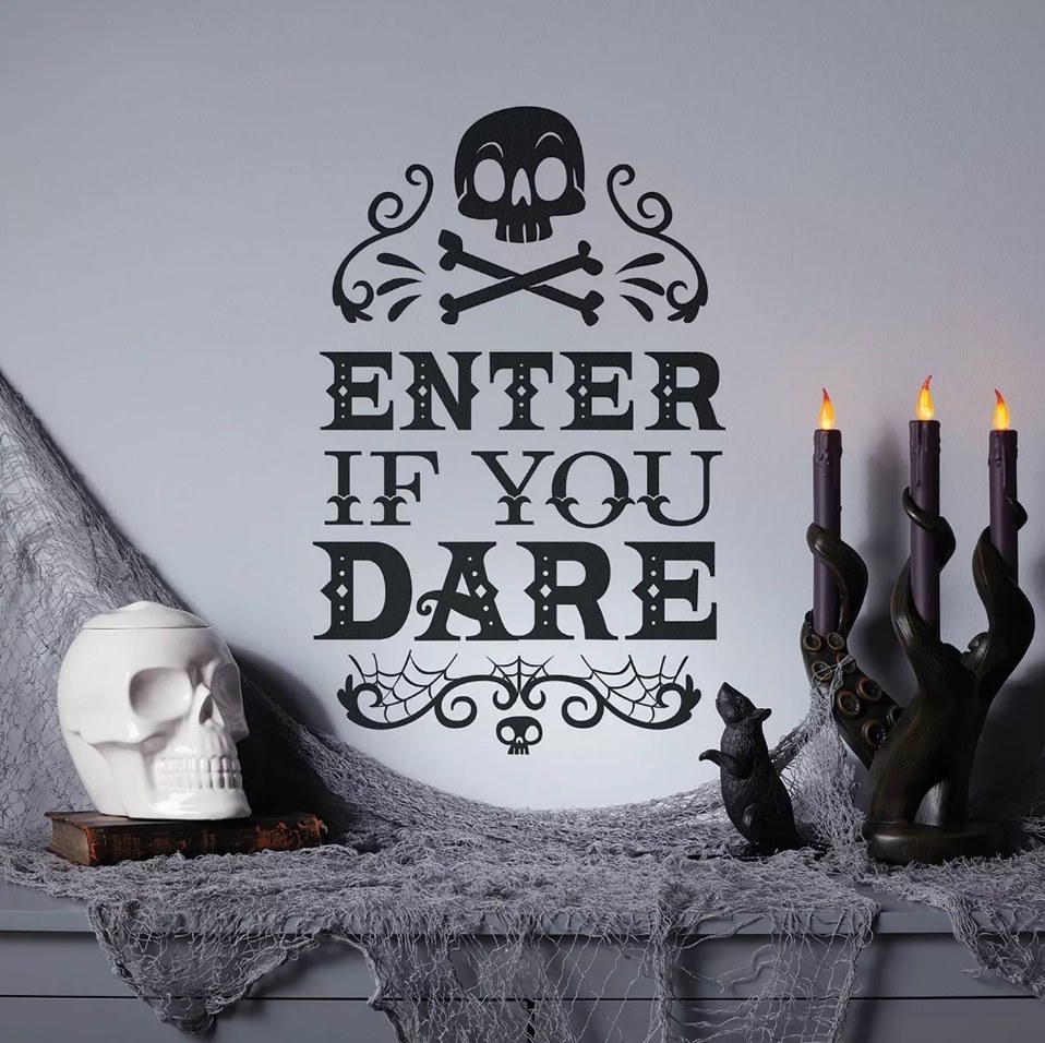 Skull and cross bones wall art with &quot;enter if you dare&quot;