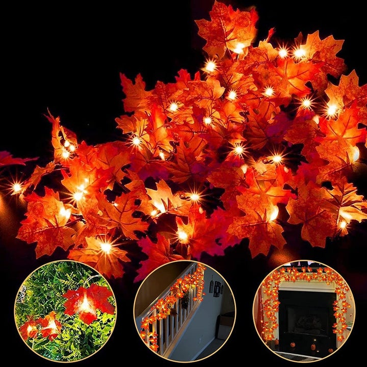 The lit up fall leaves garland  made of yellow and orange artificial leaves