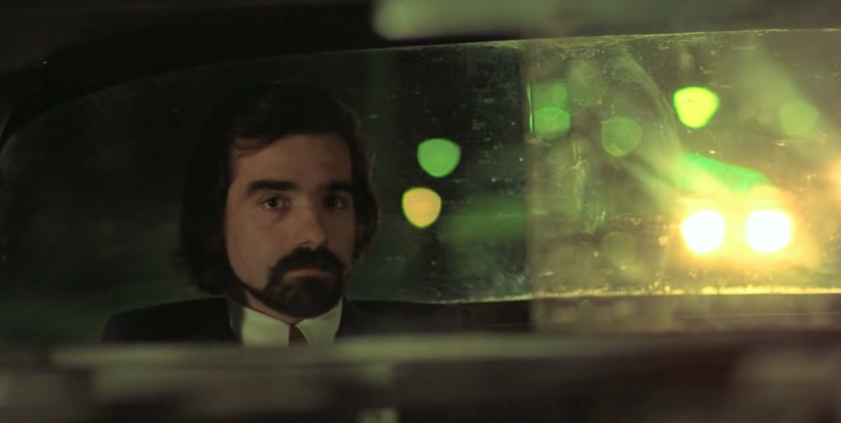 Martin Scorsese sitting in the back of a taxi