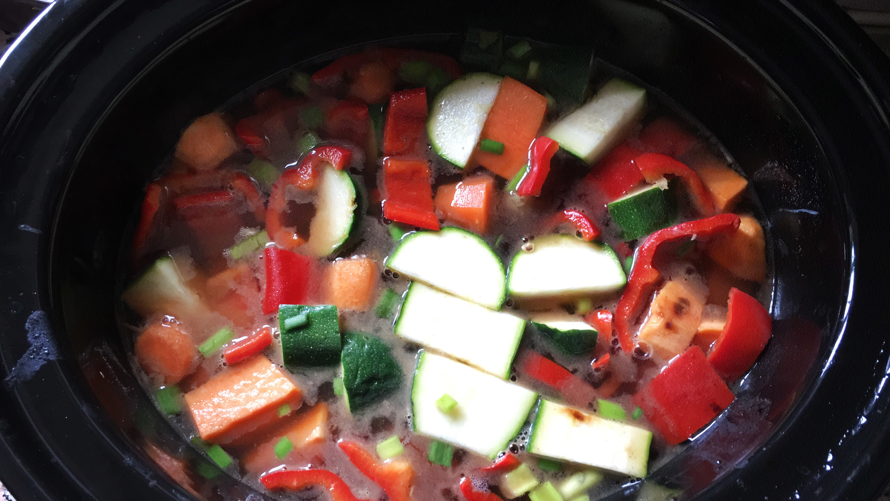 Vegetables cooking in the slow cooker.