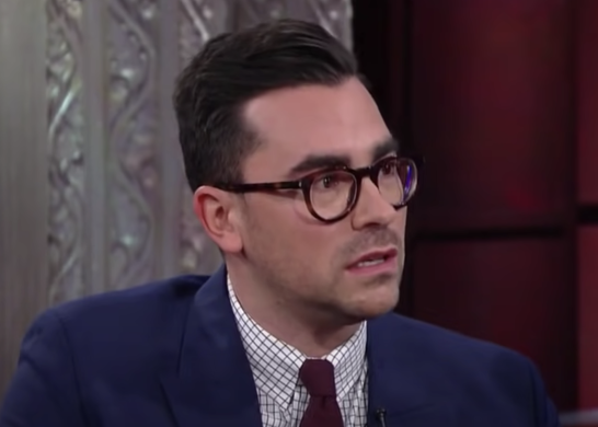 Dan Levy being interviewed