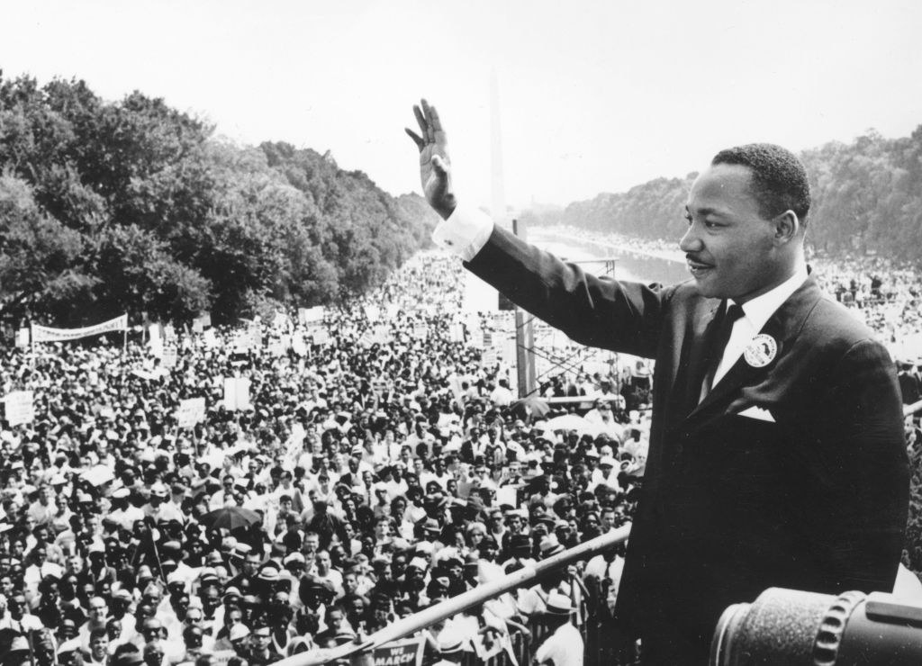Martin Luther King waving during his "I have a dream" speech