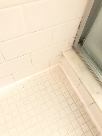the same bathroom with no mold on the sealant