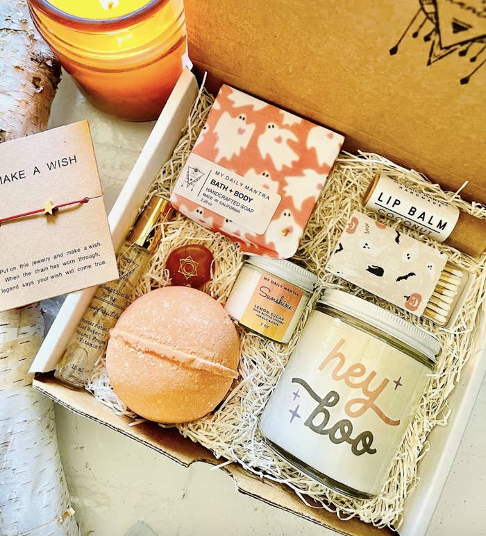 The Halloween gift box with a candle, bath bomb, soap, and other goodies