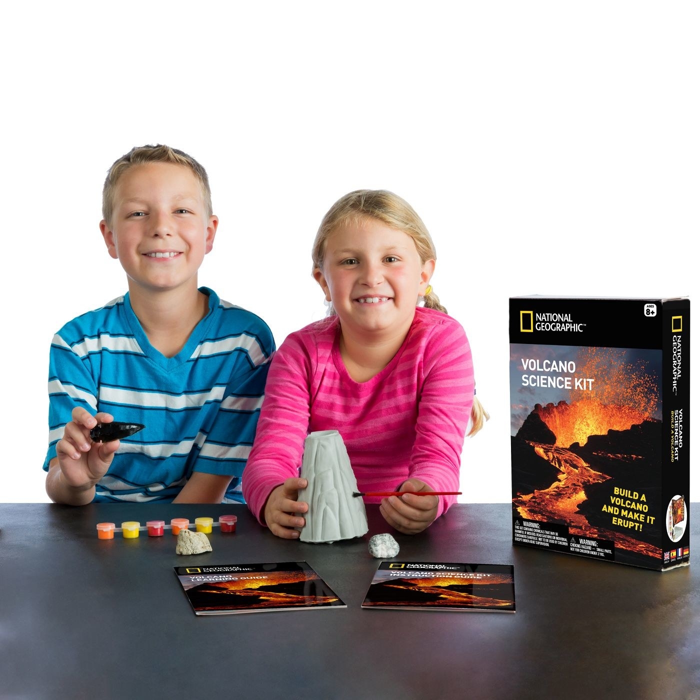 Two kids with volcano set