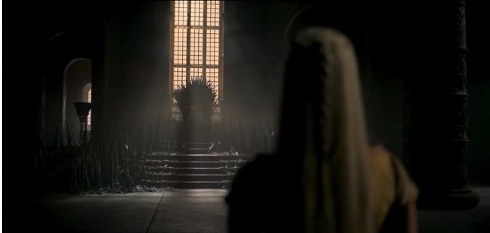 A woman faces the Iron Throne