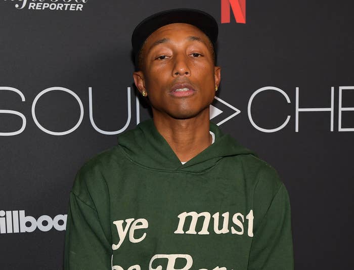 Pharrell in a hoodie on the red carpet