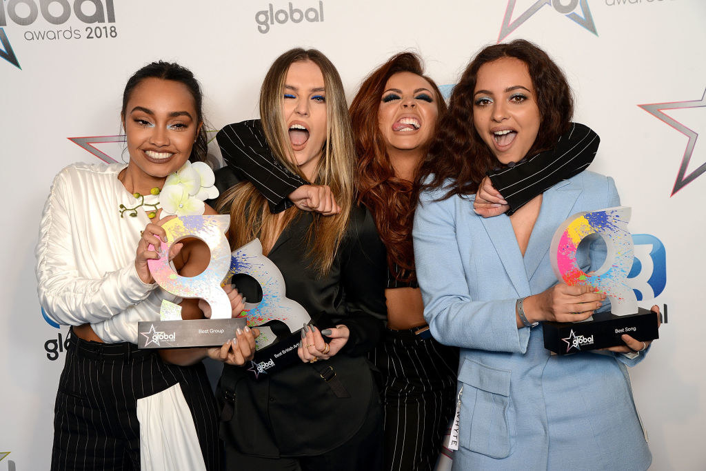 (L to R) Leigh-Anne Pinnock, Perrie Edwards, Jesy Nelson and Jade Thirlwall of Little Mix win at The Global Awards 2018