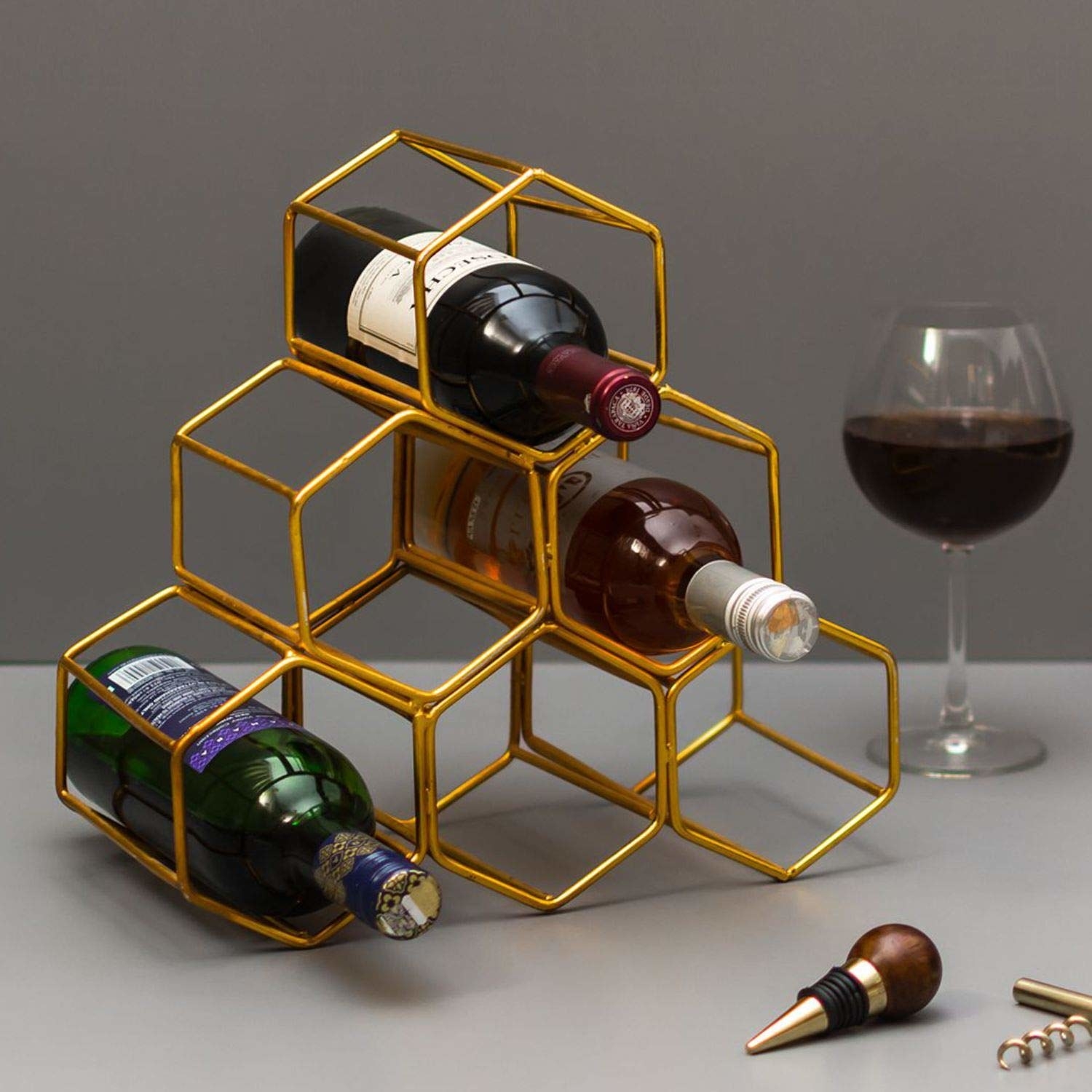 A hexagonal wine organiser with wine bottles in it