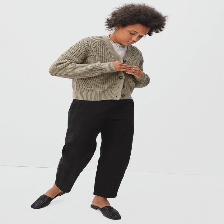 different model wearing the cardigan in sage