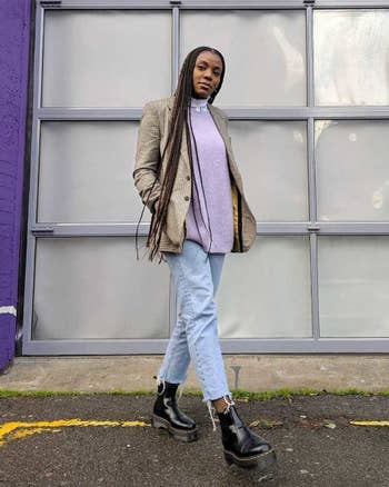 a model wearing the platform Chelsea boots
