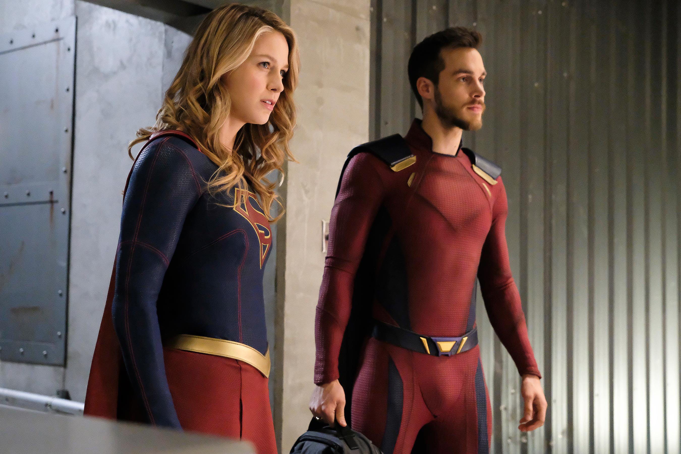 Kara and Mon-El in their supersuits