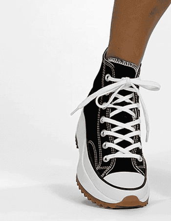 model giving a 360-degree view of the chunky sneaker