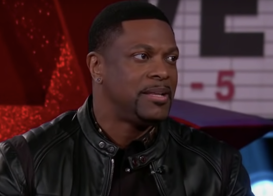 Chris Tucker being interviewed