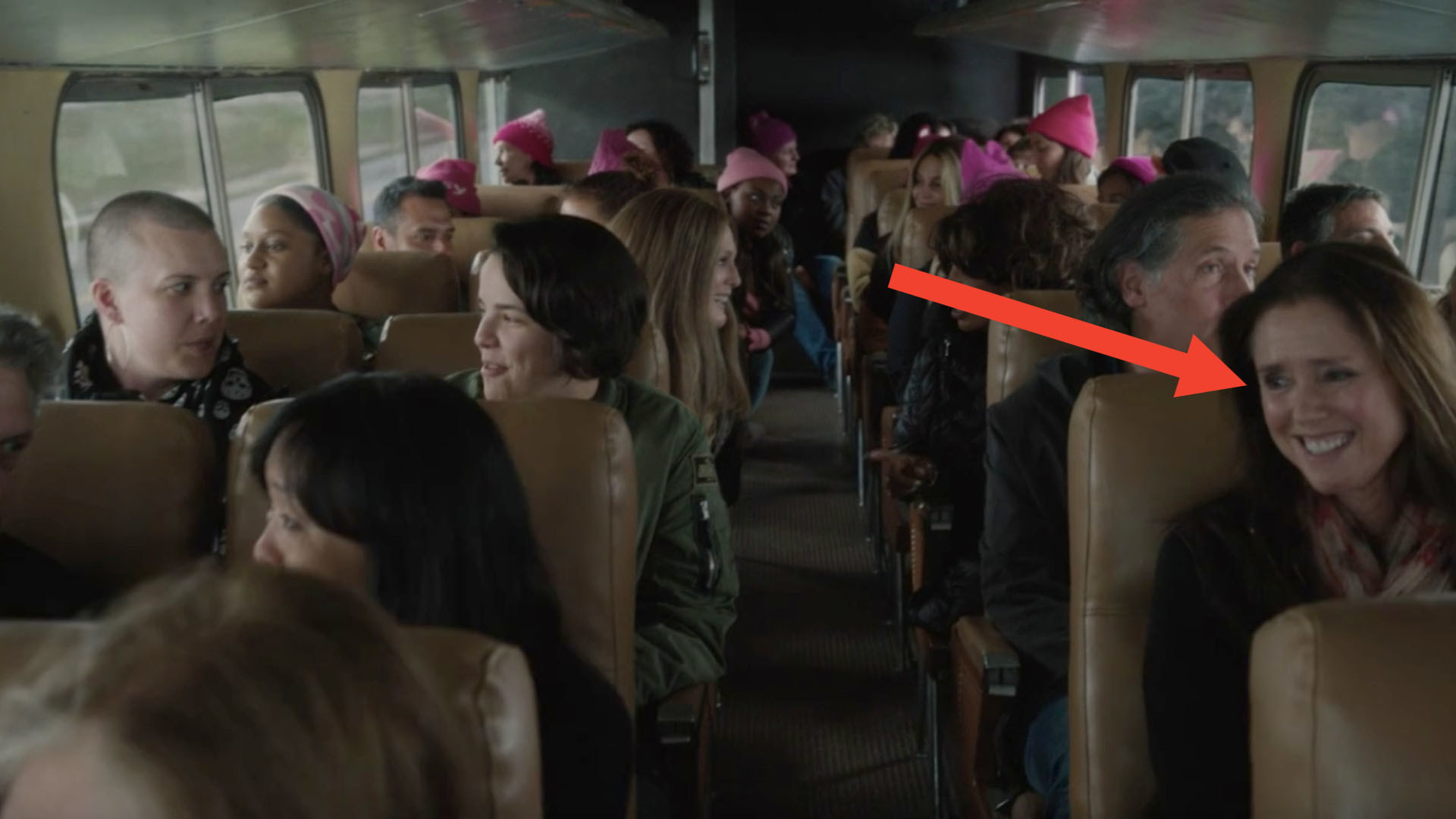 Julie Taymor sitting on the bus