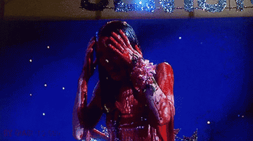 the blood falling on Carrie as she screams