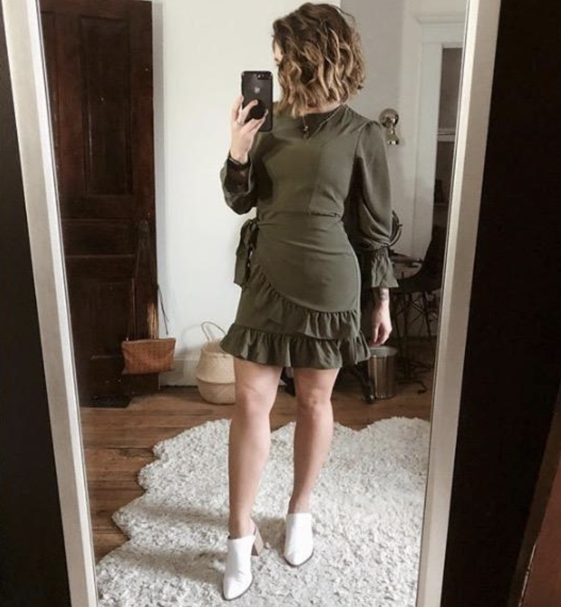 A customer review photo of them wearing the dress in army green