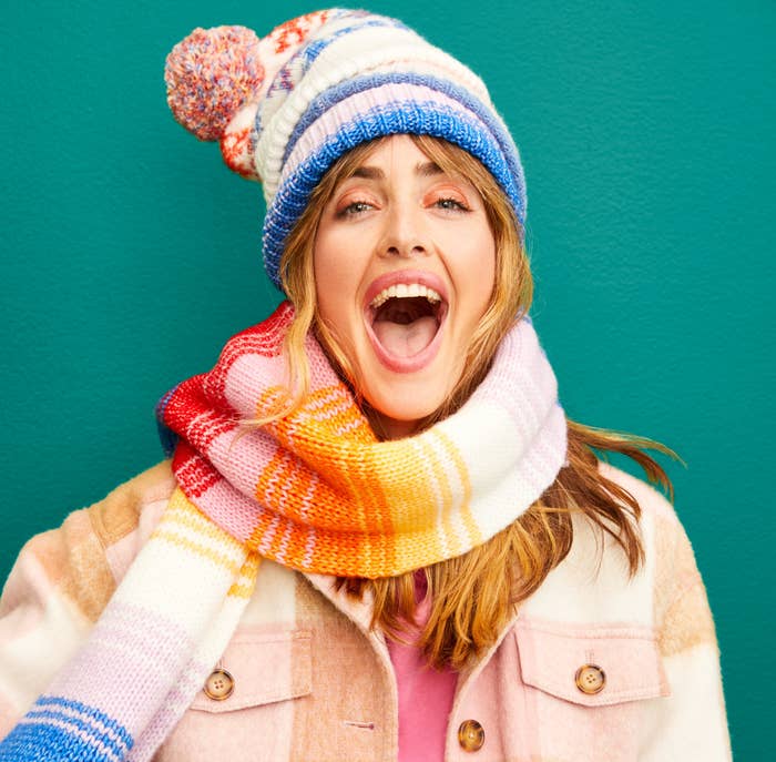 Woman smiling in cozy winter gear