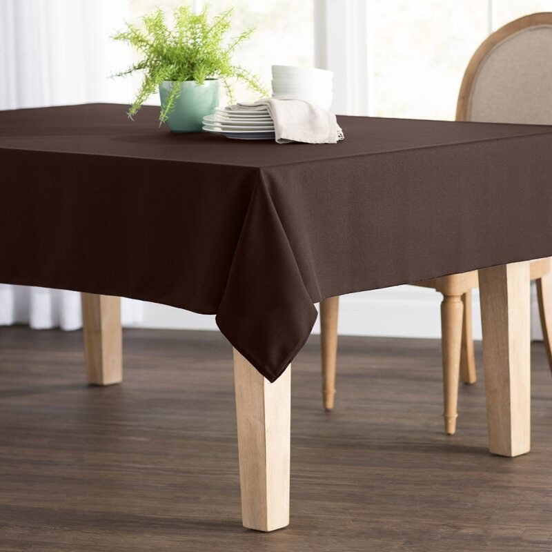 A brown tablecloth on a table