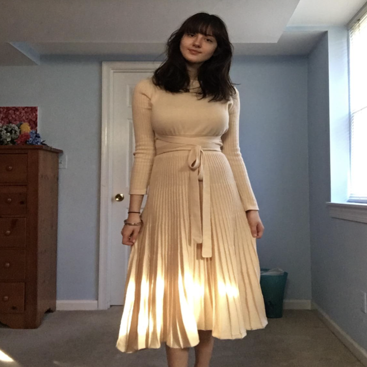 A customer review photo of the dress in beige