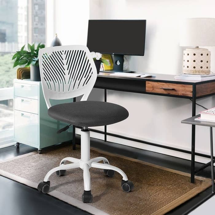A black and white office chair in home