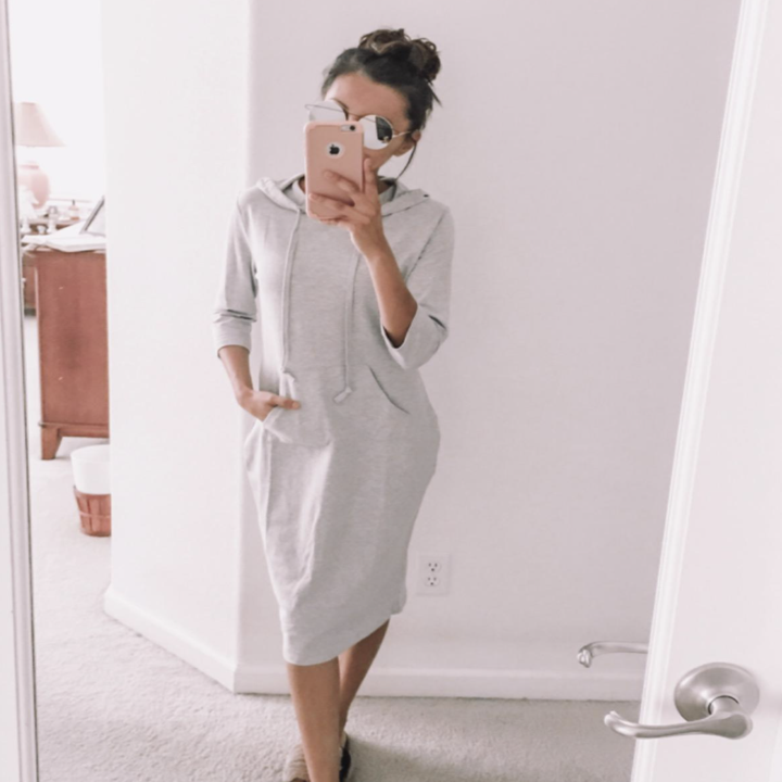 A customer review photo of them wearing the dress in gray