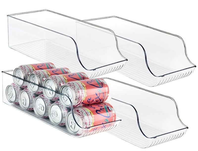 the clear bins, one with cans of seltzer