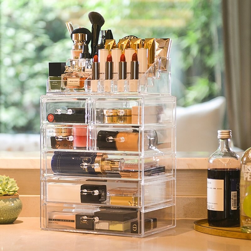 the clear organizer filled with makeup