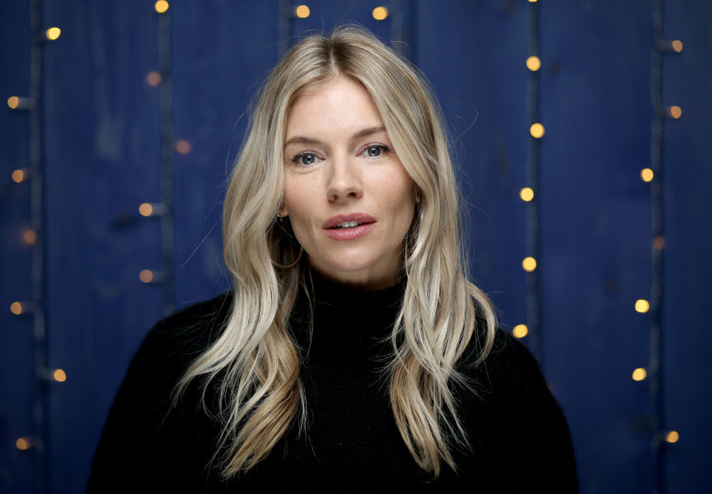 Sienna Miller in a dark turtleneck