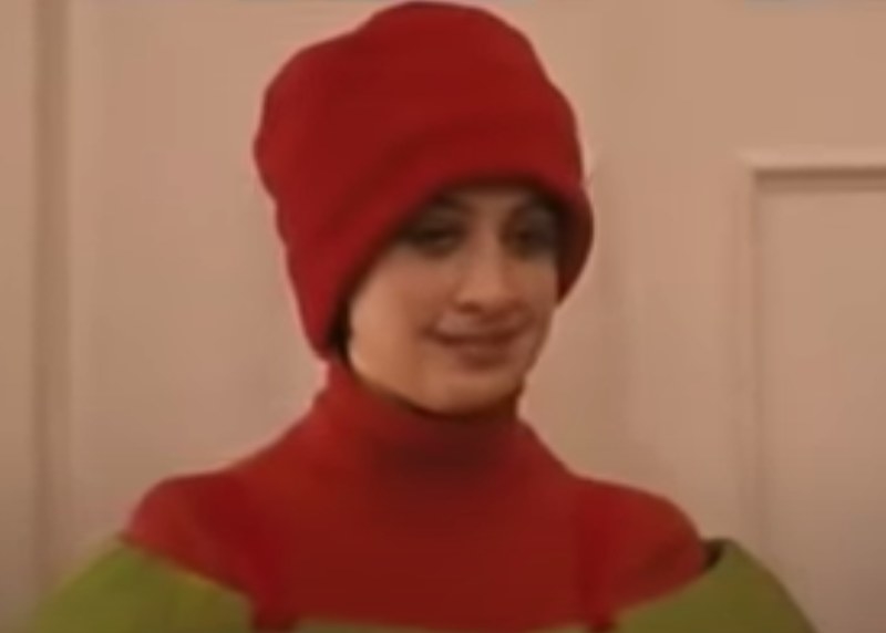 Georgia in stuffed olive costume and red beanie