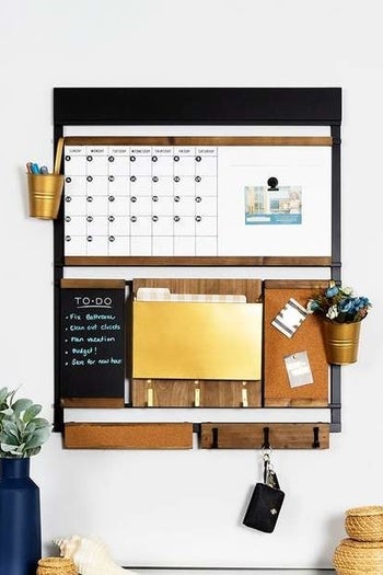command center with dry erase board and other sections to help organize life