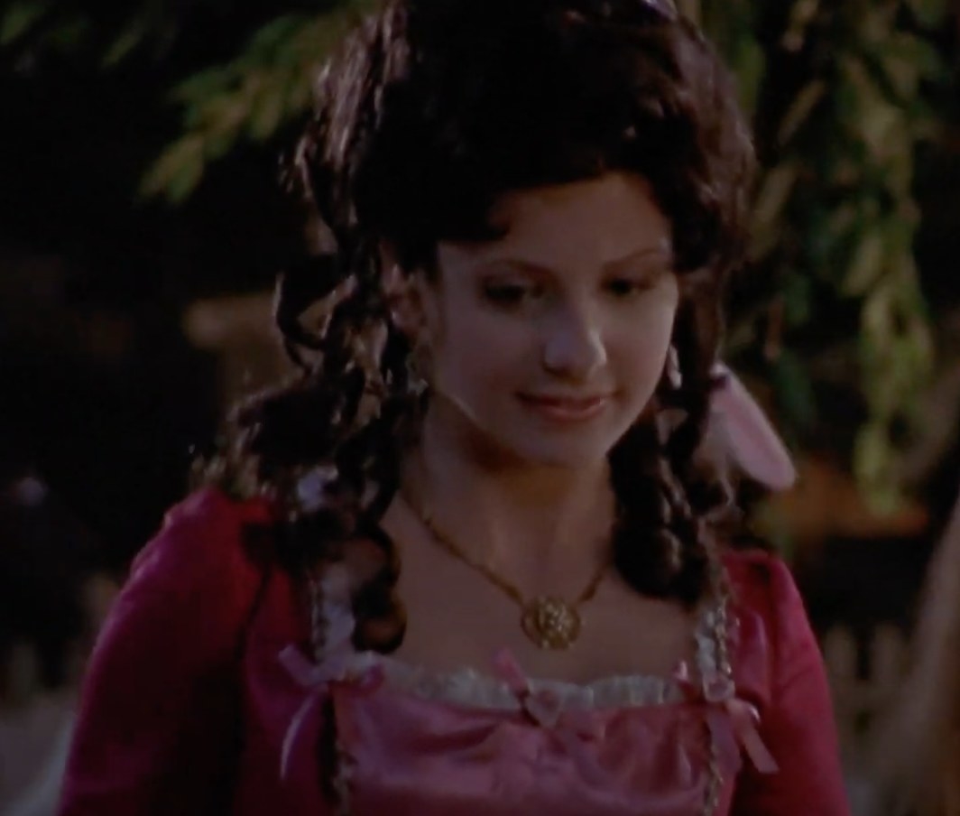 Buffy wearing pink 18th century gown