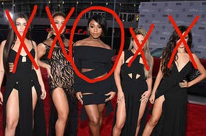 The girl group Fifth Harmony with all of their faces X'd out and Normani's face is circled