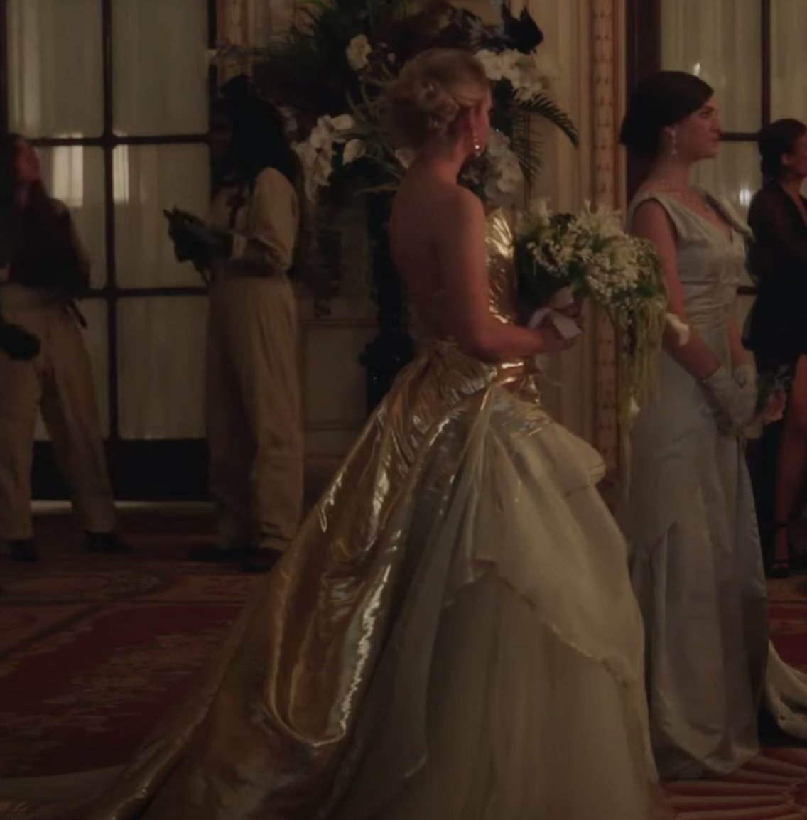 Bianca and Pippa in gold wedding dress and silver cotillion dress