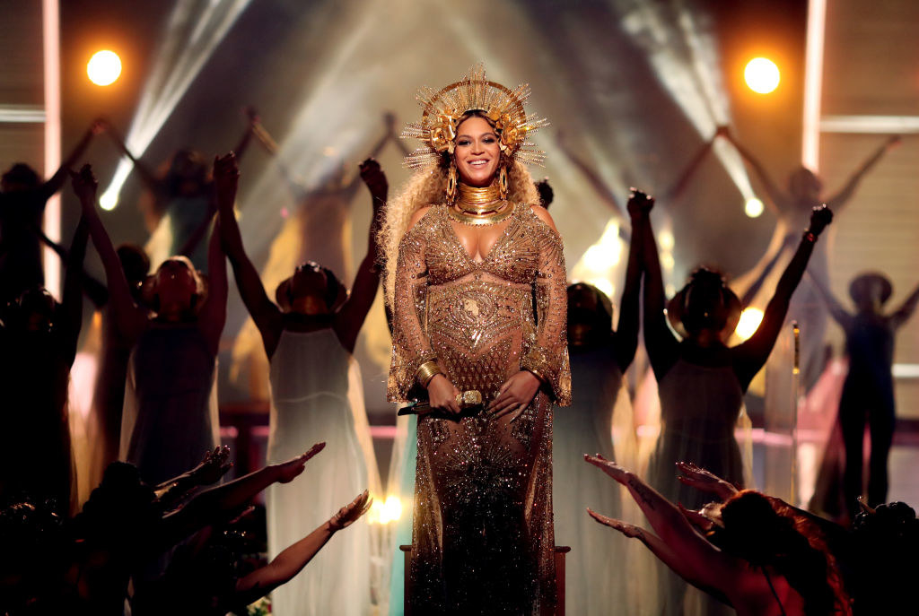 A pregnant performing at the Grammys