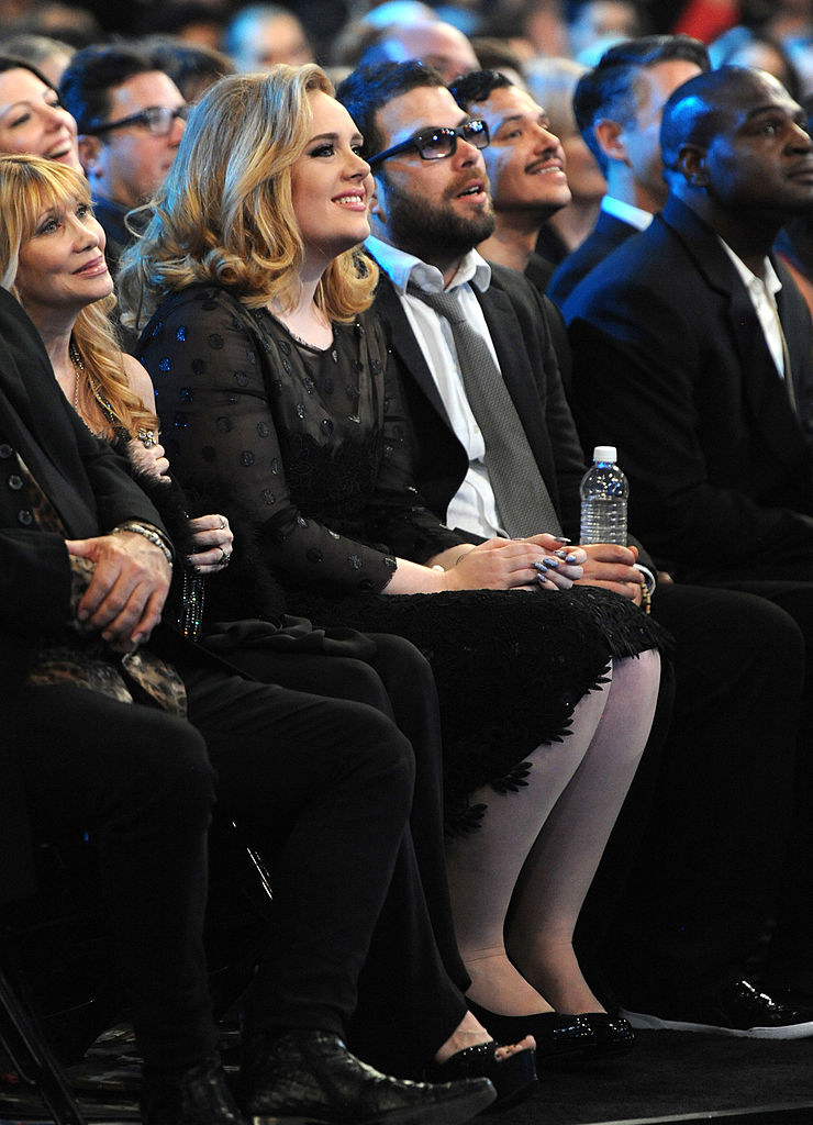 Adele and Simon Konecki sitting in the front row at the 54th Annual Grammy Awards