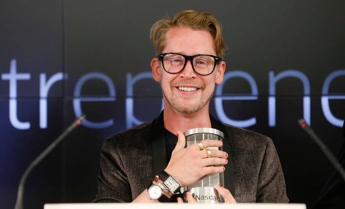 Macaulay Culkin smiles as he rings the Nasdaq Closing Bell