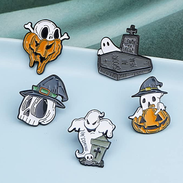 Five ghost shaped enamel pins