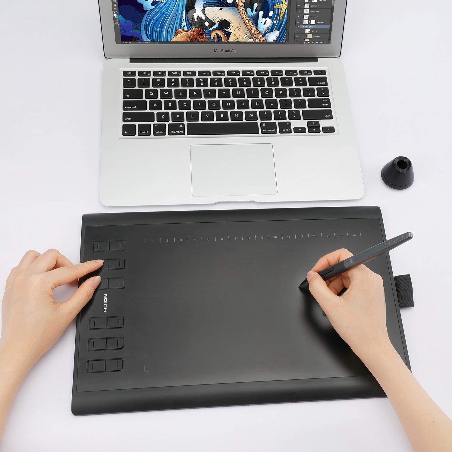 a person using the drawing tablet