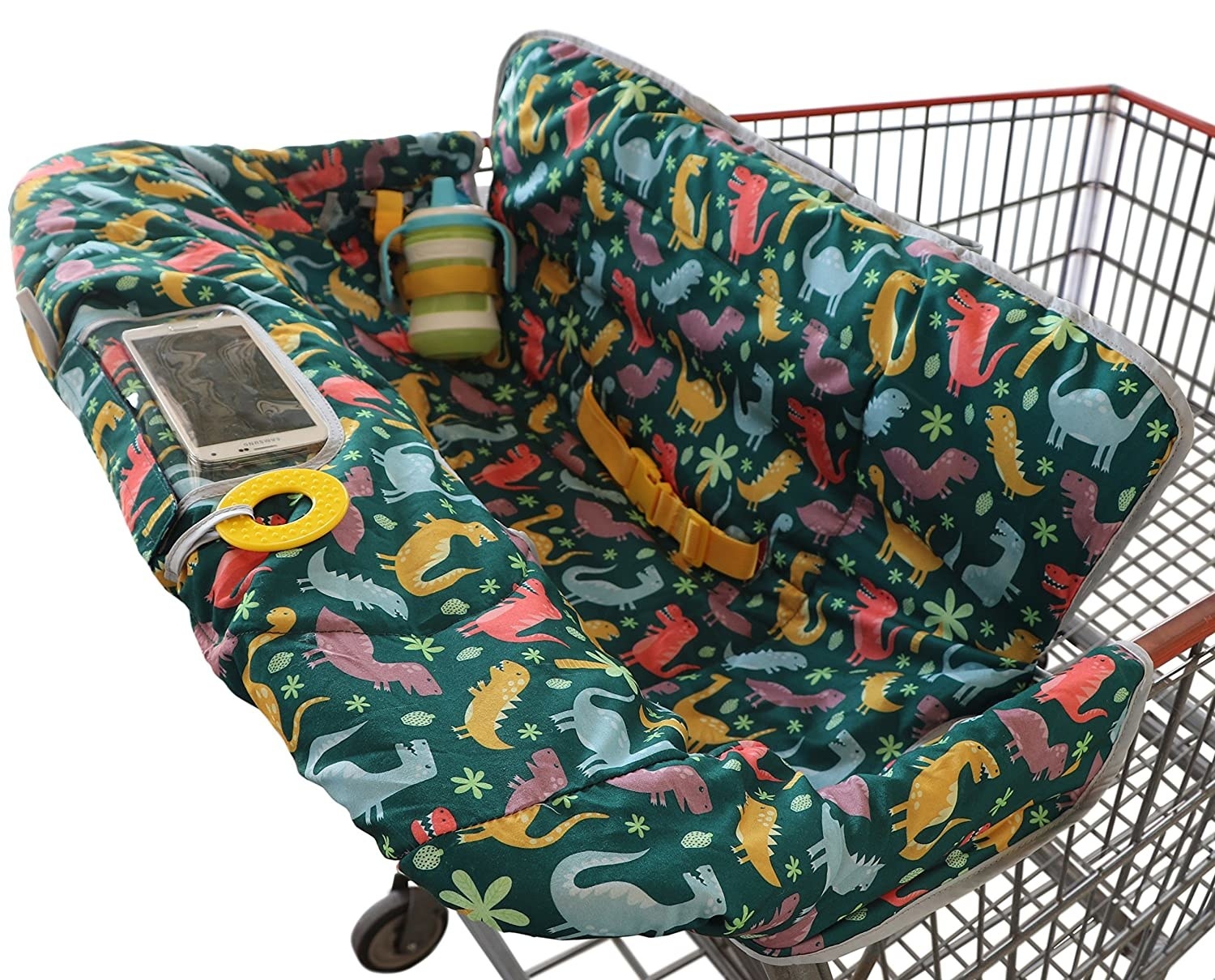 the shopping cart cover with dinosaurs on it