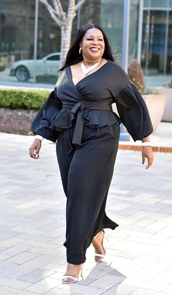 reviewer wearing the top in black