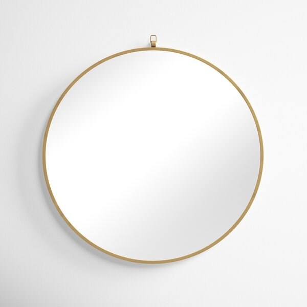 the mirror in gold