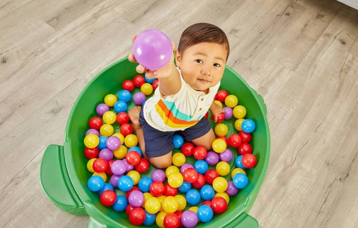 a child playing with the balls