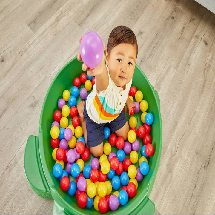 a child playing with the balls